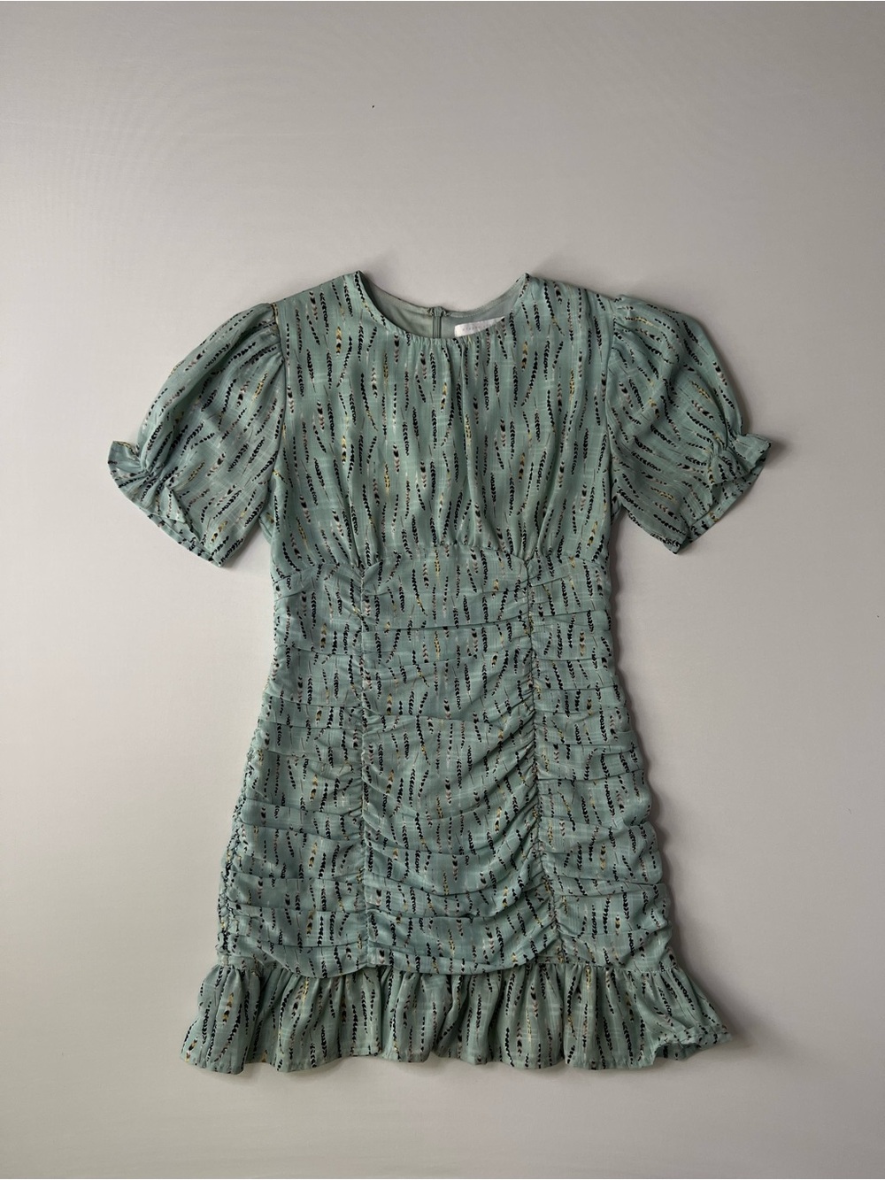 Mini Dress in Mint Green with Ruching and Ruffle Hem
